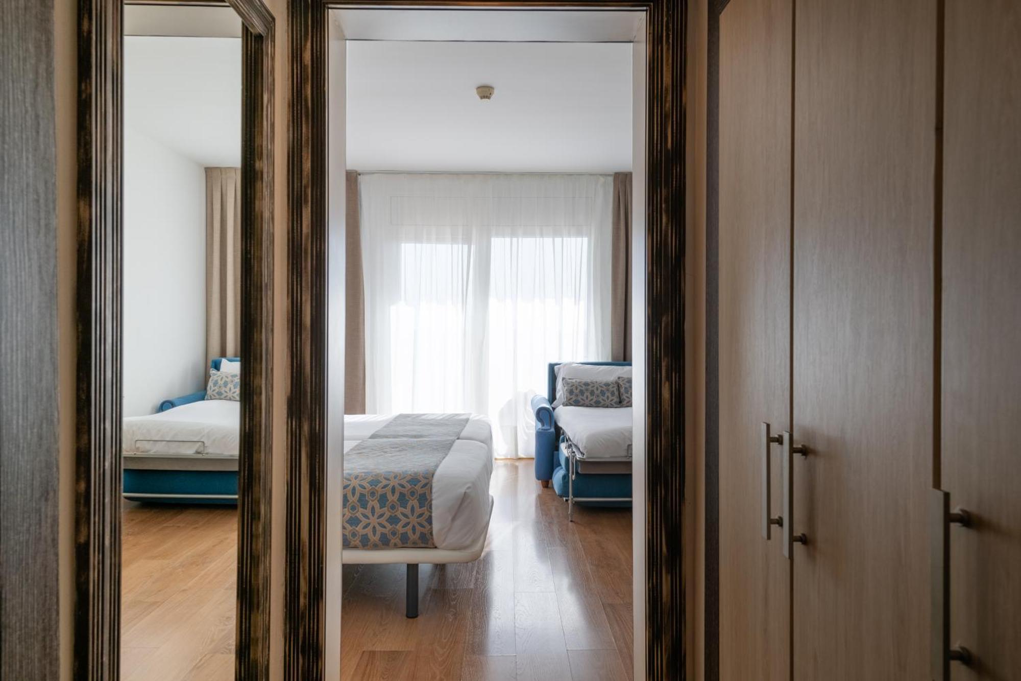 Dreibettzimmer mit Meerblick